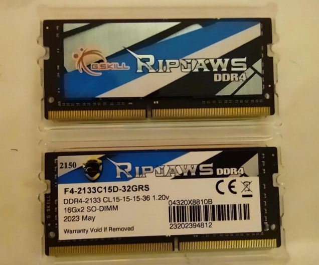 two ram sticks with stickers that cover the entire face of the ram stick